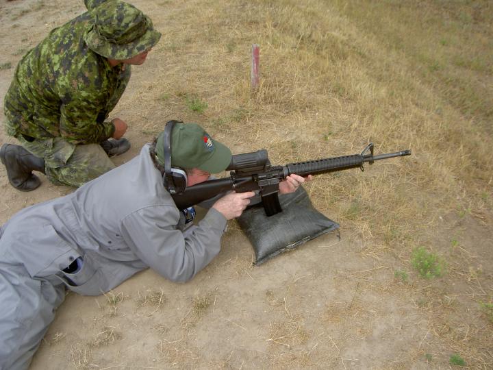 Firing a C-7 assault rifle on the range
